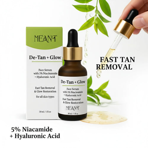 MEANT De-Tan + Glow face serum with packaging and dropper on a white background