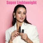 Model holding MEANT Electric Blush lipstick with 'Super Lightweight' text on a pink background