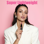 Model holding MEANT Lavish Lustre lipstick.