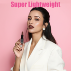 Woman holding MEANT Mystique Tease lipstick with 'Super Lightweight' text on a pink background.