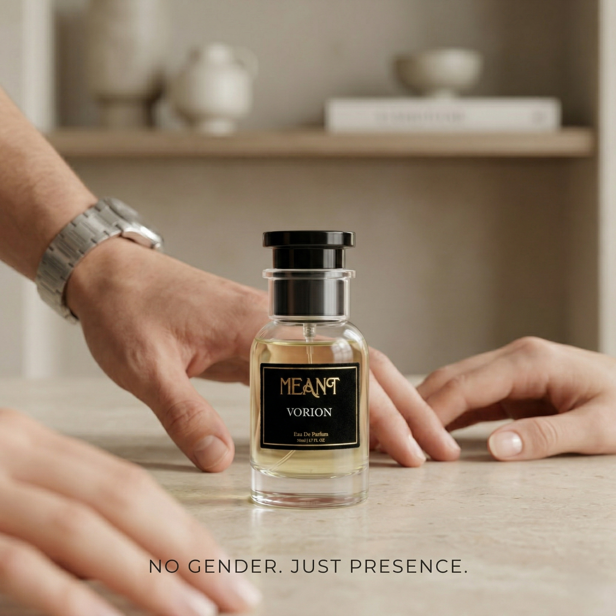 MEANT Vorion perfume bottle held by hands with a neutral background with text 'No gender. Just presence' to show its unisex appeal.