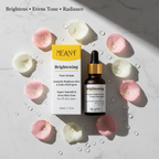 MEANT Glass Skin Glow Duo brightening serum and organic rose water mist with size reference in hand